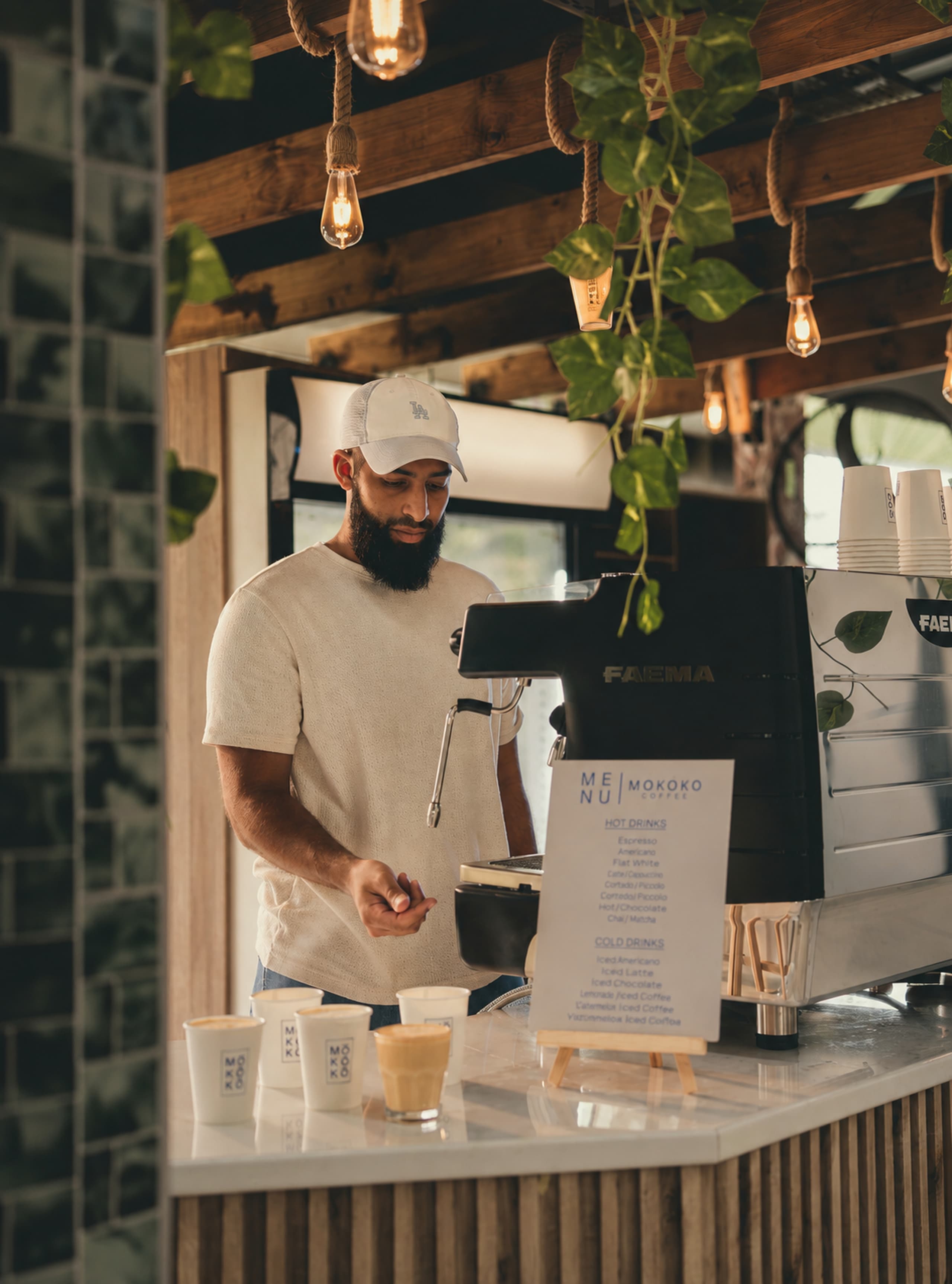 A quiet portrait of a MOKOKO barista at work.